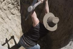 Charmaine digging a hole for herself on the farm