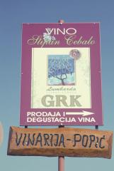 at the sign of Grk